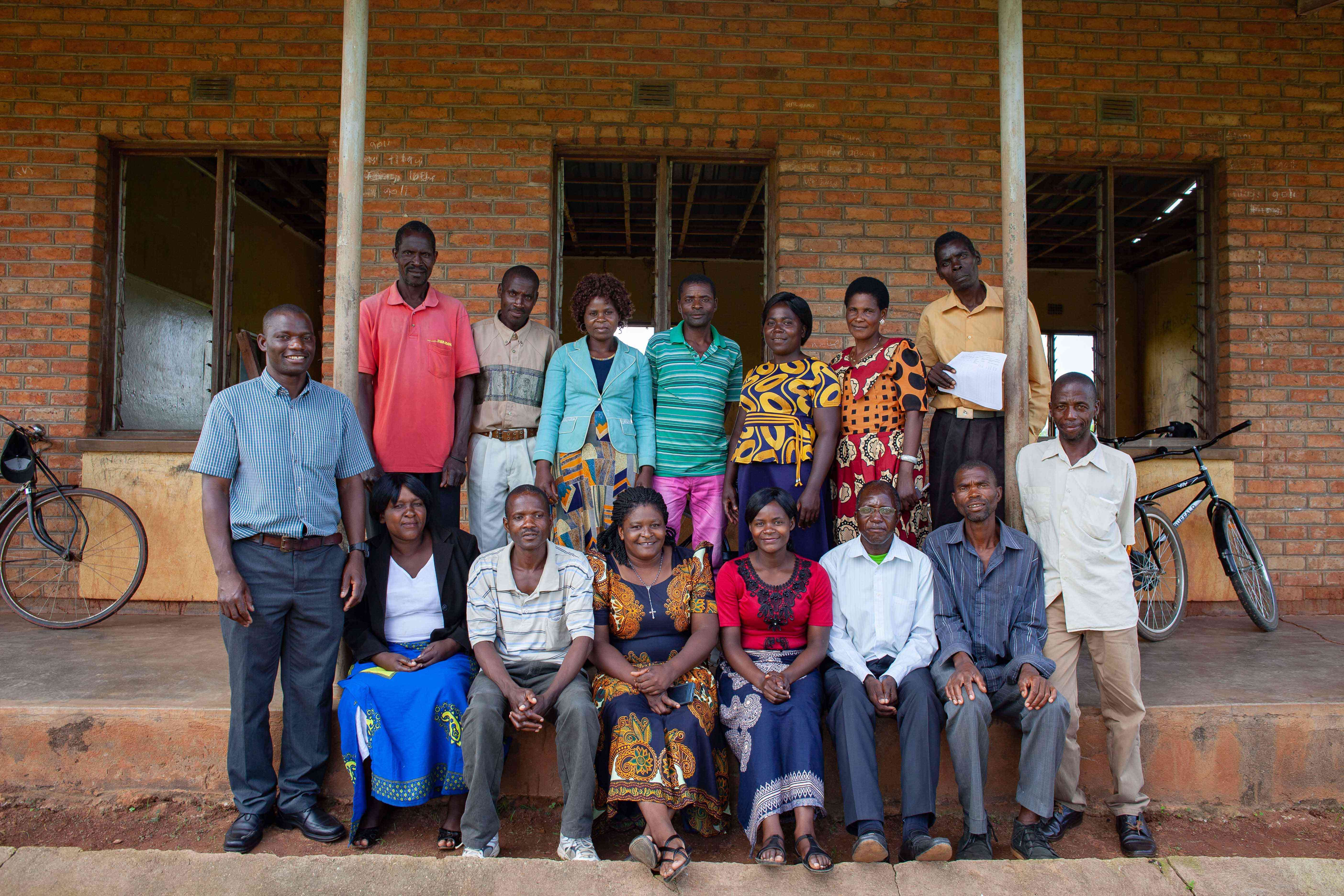 CAHWs, government officers after a review meeting